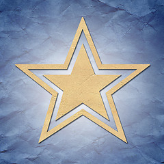 Image showing star of paper on background 