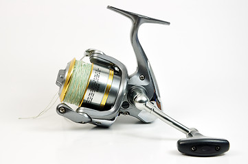 Image showing Fishing reel isolated on white. 