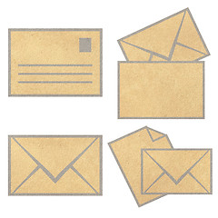 Image showing Brown Vintage Envelope with blank paper on white. 