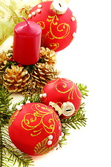 Image showing Christmas composition with red balls and candles.