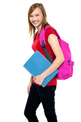 Image showing Good looking young girl leaving for college