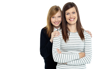 Image showing Daughter embracing her mother from behind