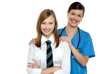 Image showing Graceful doctor posing with her teenage patient