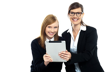 Image showing Tutor with student holding portable tablet pc