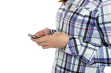 Image showing Cropped image of a girl in checked sending messages