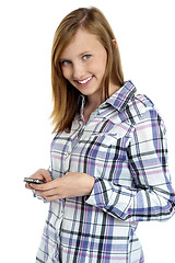 Image showing Pretty girl messaging her boyfriend