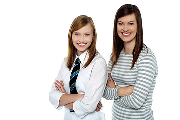 Image showing Beautiful mom and daughter posing with confidence