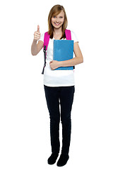 Image showing College going blonde showing thumbs up sign