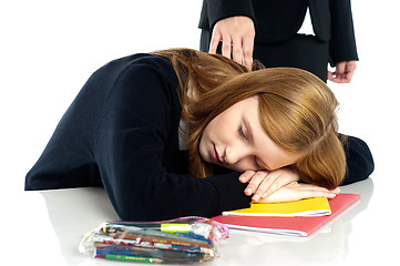 Image showing Teacher waking up a dozed off student