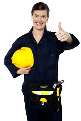 Image showing Woman in builder uniform showing thumbs up