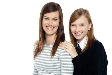 Image showing Daughter resting hands on mothers shoulders