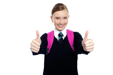 Image showing Bright student showing thumbs up sign