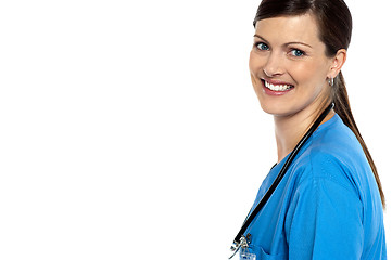 Image showing Smiling doctor with stethoscope around her neck