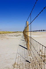 Image showing Fence Under Clear Skies