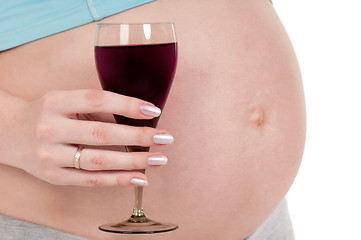 Image showing Pregnant belly with wine