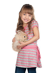 Image showing Little girl with rabbit