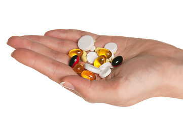 Image showing Hand with pills