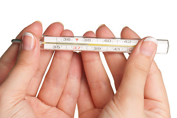 Image showing Hand with thermometer