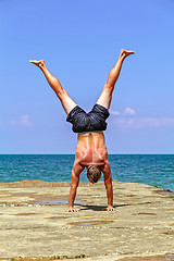 Image showing Gymnast at the sea