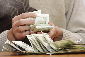 Image showing  Cash dollars in hands