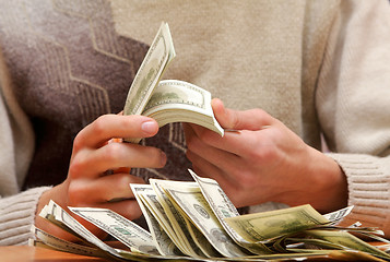 Image showing  Cash dollars in hands