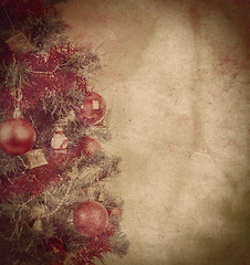 Image showing grunge christmas background with balls on tree 