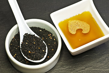 Image showing black cumin seeds and black cumin oil