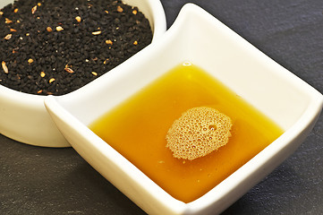 Image showing black cumin seeds and black cumin oil