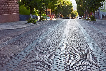 Image showing Wide cobbled road