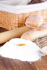 Image showing bread, flour, eggs and kitchen utensil