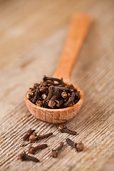 Image showing cloves in wooden spoon 