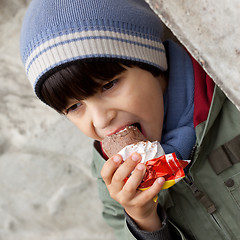 Image showing child eating ice cream