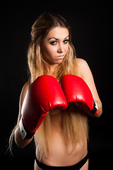 Image showing beautiful nude girl with boxing gloves