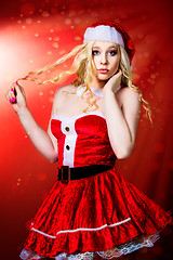 Image showing beautiful sexy girl wearing santa claus clothes