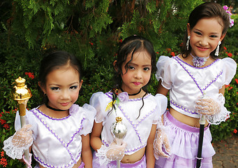 Image showing Beautiful young Thai girls in purple outfits before a parade in