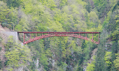 Image showing Red bridge with mountain in Switzerland