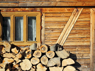 Image showing firewood near a lodge