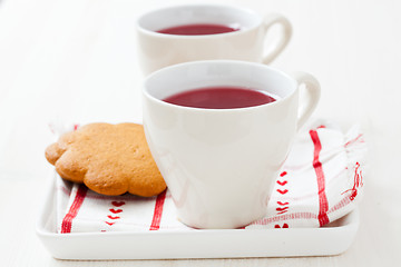 Image showing Christmas mulled wine and gingerbread biscuits