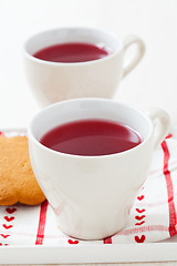 Image showing Christmas mulled wine and gingerbread biscuits