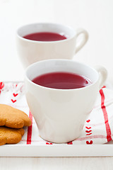 Image showing Christmas mulled wine and gingerbread biscuits