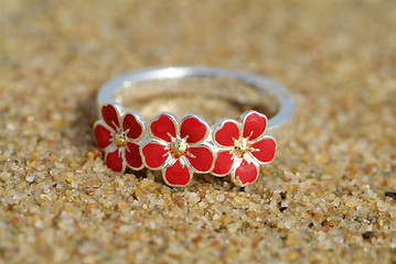 Image showing Silver ring on the beach