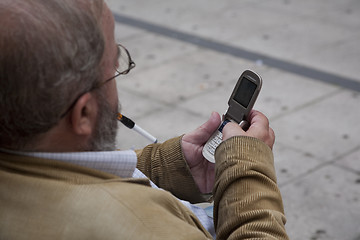 Image showing Senior man with mobile