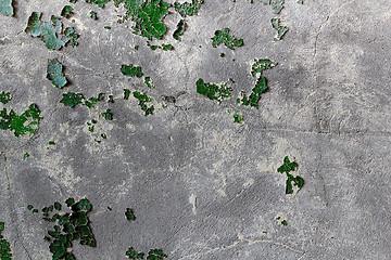 Image showing concrete wall with remains of an old green paint