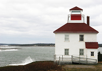 Image showing Old building with a red roof