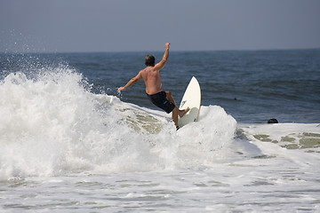 Image showing Backlit surfer