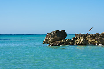 Image showing Calm Caribbean sea with rocks 