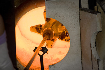 Image showing Glass furnace. Glass Blower at Work