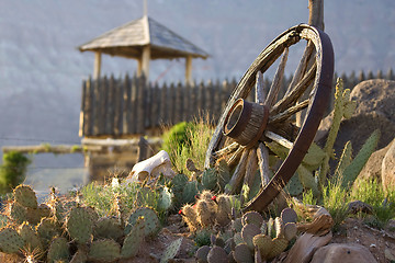 Image showing Wagon wheel on yard of Fort Zion