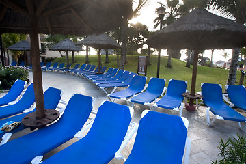 Image showing Sraw umbrella at sandy beach