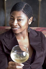 Image showing beautiful black woman on sofa